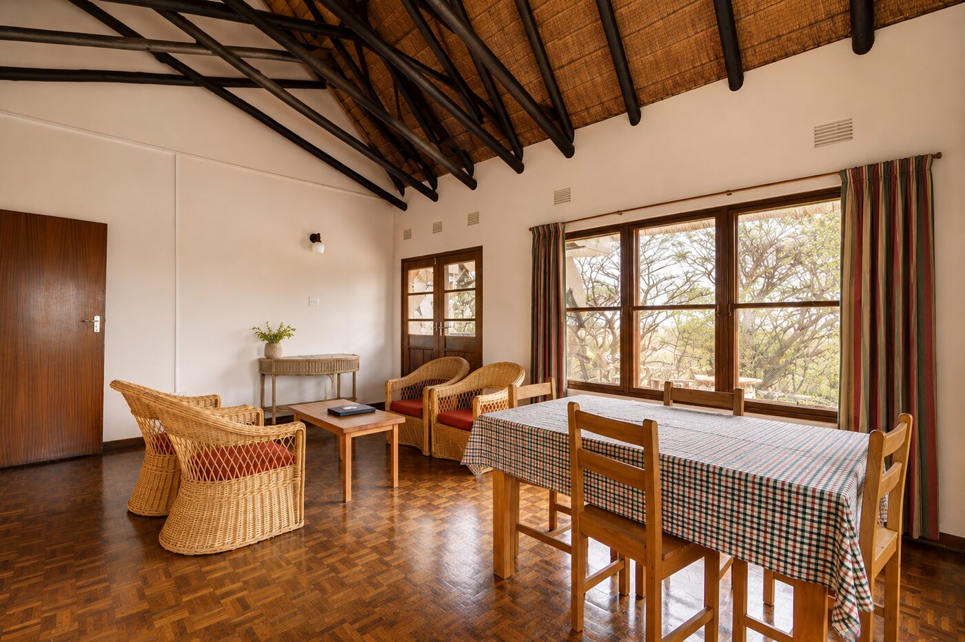 Spacious thatched lounge-dining interior