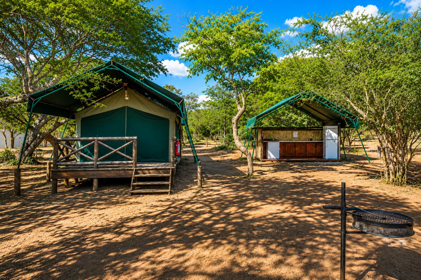 Safari tents set among woodland at Mantuma Camp